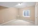 Finished basement room with a window, neutral walls, and ample space for various uses at 9743 Las Colinas Dr, Lone Tree, CO 80124