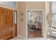 Welcoming entryway leads to a bright office and showcases the home's open floor plan at 9743 Las Colinas Dr, Lone Tree, CO 80124
