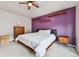 Bright bedroom featuring floating shelves, plush carpet, and light-filled window views at 12919 W Burgundy Dr, Littleton, CO 80127