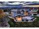 Aerial view of a luxury home with a large backyard, mountain views, and beautiful landscaping at 15102 Prairie Pl, Broomfield, CO 80023