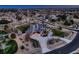 Aerial view of a beautiful neighborhood featuring a landscaped yard, a long driveway, and mature trees at 15102 Prairie Pl, Broomfield, CO 80023