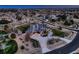 An aerial view of a luxurious property featuring lush landscaping and a sprawling driveway at 15102 Prairie Pl, Broomfield, CO 80023