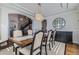 Formal dining room with coffered ceilings, buffet, and view to staircase at 15102 Prairie Pl, Broomfield, CO 80023