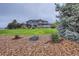Beautiful home with an expansive lawn and meticulous landscaping at 15102 Prairie Pl, Broomfield, CO 80023