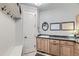 Laundry room with built-in cabinets and a sink at 15102 Prairie Pl, Broomfield, CO 80023