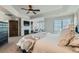 Main bedroom with fireplace, sitting area and large windows at 15102 Prairie Pl, Broomfield, CO 80023