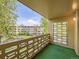Outdoor balcony provides treetop views of the community and other buildings at 750 S Clinton St # 2C, Denver, CO 80247