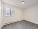 Bright bedroom featuring carpet flooring and window with blinds at 750 S Clinton St # 2C, Denver, CO 80247