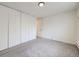 Simple bedroom with carpet flooring and ample closet space at 750 S Clinton St # 2C, Denver, CO 80247