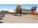 CenterPoint restaurant and golf course building with ample parking, visible signage, and attractive architecture at 750 S Clinton St # 2C, Denver, CO 80247