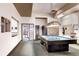 Spacious game room with a billiard table, library access, and amenities for leisure activities at 750 S Clinton St # 2C, Denver, CO 80247