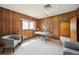 Home office with wood paneling, large window and modern decor at 8020 W 46Th Cir, Wheat Ridge, CO 80033