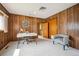 Home office with wood paneling, large window and modern decor at 8020 W 46Th Cir, Wheat Ridge, CO 80033