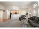 Inviting living room with an open concept, seamlessly connecting the kitchen, dining, and lounge areas at 23625 E Kettle Pl, Aurora, CO 80016