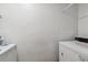 On-site laundry room with several white washing machines and dryers, clean interior at 625 N Pennsylvania St # 208, Denver, CO 80203