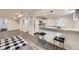 Basement bar and kitchen area with stainless appliances and granite countertops at 427 Hickory St, Broomfield, CO 80020