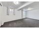 Cozy bedroom with two bright windows and carpeted floor at 427 Hickory St, Broomfield, CO 80020