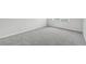 Image shows a room with new carpet, neutral paint and window at 7395 E Quincy Ave # 207, Denver, CO 80237