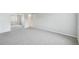 Large bedroom with carpet floors, big windows and mirror closet doors at 7395 E Quincy Ave # 207, Denver, CO 80237