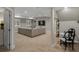 Spacious basement is highlighted with a plush sectional sofa, windows and neutral carpet at 3929 Spanish Oaks Trl, Castle Rock, CO 80108
