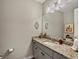 Bathroom with granite countertops, grey cabinetry, updated fixtures and decor at 3929 Spanish Oaks Trl, Castle Rock, CO 80108