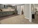 Finished basement wet bar with beverage fridge, backsplash and cabinetry at 3929 Spanish Oaks Trl, Castle Rock, CO 80108