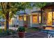 Cozy backyard features a patio, bay windows, and a view of the home's outdoor space at 505 Orchard Dr, Louisville, CO 80027