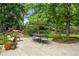Inviting backyard patio with lush landscaping and comfortable seating area at 505 Orchard Dr, Louisville, CO 80027
