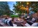 Relaxing outdoor fire pit area with comfortable seating and string lights, creating a cozy atmosphere at 505 Orchard Dr, Louisville, CO 80027