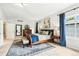 Bright main bedroom with king bed, stylish decor, and a comfortable rug, creating a peaceful retreat at 505 Orchard Dr, Louisville, CO 80027