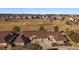 Beautiful aerial view of houses near a golf course surrounded by homes in a residential community at 7679 S Biloxi Way, Aurora, CO 80016