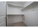 Spacious walk-in closet with adjustable shelving and ample storage space at 7679 S Biloxi Way, Aurora, CO 80016