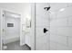 Sleek bathroom shower area with modern fixtures and white tile at 1383 W 88Th Ave # 307, Thornton, CO 80260