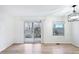 Inviting living room with hardwood floors and balcony access at 1383 W 88Th Ave # 307, Thornton, CO 80260