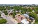 An aerial view of a quiet residential area featuring tree-lined streets and well-maintained properties at 3106 N Franklin St, Denver, CO 80205