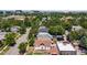 An aerial view overlooking a peaceful neighborhood with mature trees and a mix of residential homes at 3106 N Franklin St, Denver, CO 80205