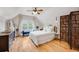Bright bedroom featuring hardwood floors, lots of light, and a modern design at 3106 N Franklin St, Denver, CO 80205