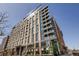 Modern high-rise building with sleek architecture and multiple balconies at 1901 Wazee St # 305, Denver, CO 80202