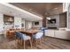 Large entertaining space with dining table, kitchen island, fireplace and billiards table at 1901 Wazee St # 305, Denver, CO 80202