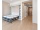 Bright living room showcasing a murphy bed pulled down, ready for a comfortable night's sleep at 1901 Wazee St # 305, Denver, CO 80202