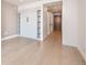 Spacious living room featuring a built-in murphy bed and access to the main hallway at 1901 Wazee St # 305, Denver, CO 80202