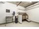 Pet spa area with stainless steel washing tub, grooming table, and convenient washing equipment at 1901 Wazee St # 305, Denver, CO 80202