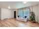 Cozy living room features hardwood floors, natural light, and comfortable seating at 366 Kenton St, Aurora, CO 80010