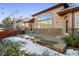 Backyard with patio, stone wall and mountain views at 486 S Youngfield Cir, Lakewood, CO 80228