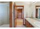 Bathroom with double vanity and shower at 486 S Youngfield Cir, Lakewood, CO 80228