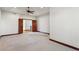 Large secondary bedroom with double doors leading to the hallway at 486 S Youngfield Cir, Lakewood, CO 80228