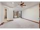 Spacious primary bedroom with ensuite bathroom and access to a private patio at 486 S Youngfield Cir, Lakewood, CO 80228