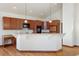 Kitchen with island and hardwood floors at 486 S Youngfield Cir, Lakewood, CO 80228