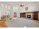 Spacious living room with fireplace and high ceilings at 486 S Youngfield Cir, Lakewood, CO 80228