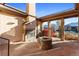Outdoor patio with fireplace and fire pit at 486 S Youngfield Cir, Lakewood, CO 80228
